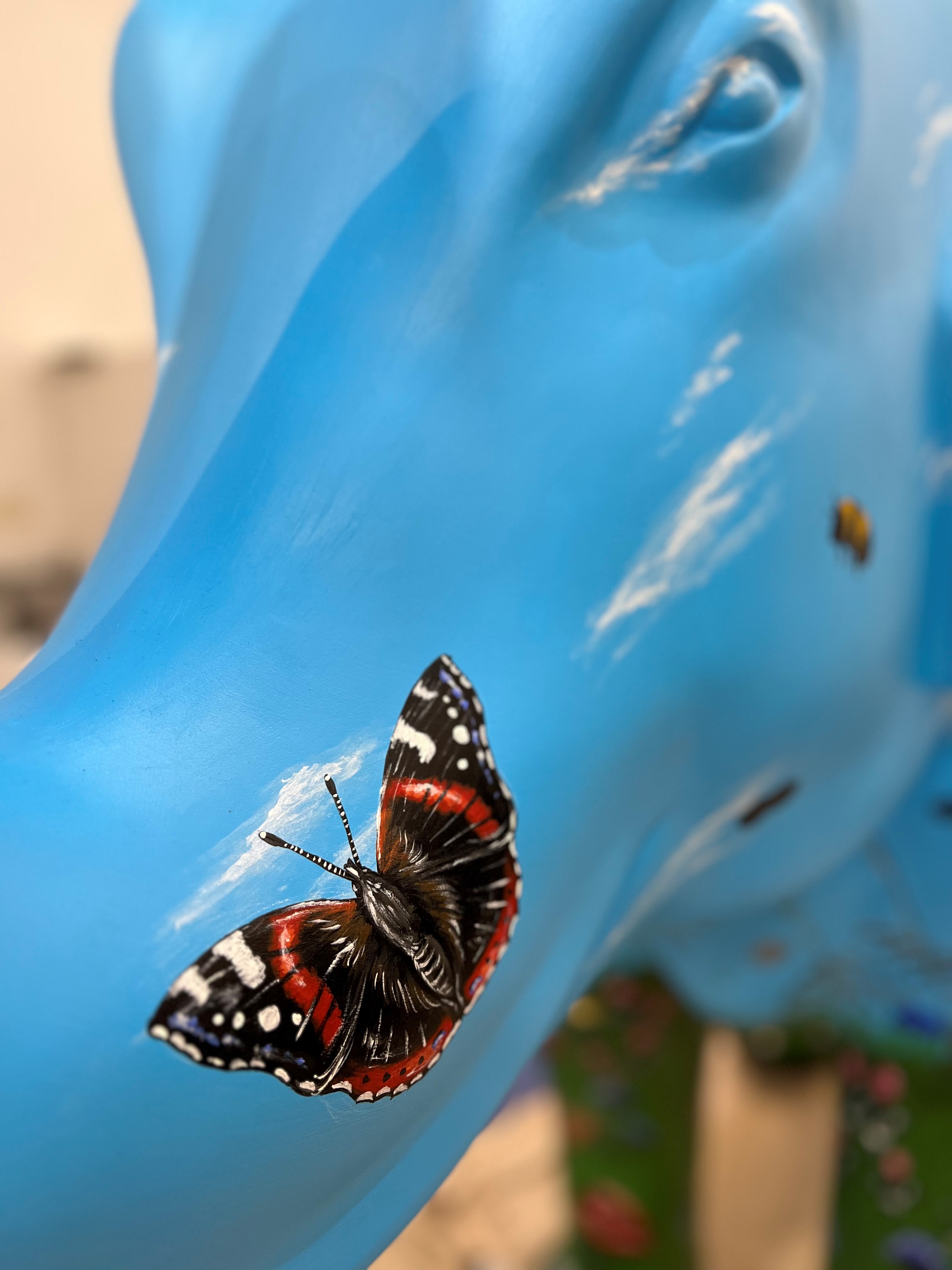 picture of Butterfly painted on blue elephant